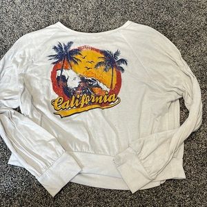 Soul cake long sleeve cropped shirt. White with a colorful design. Size M